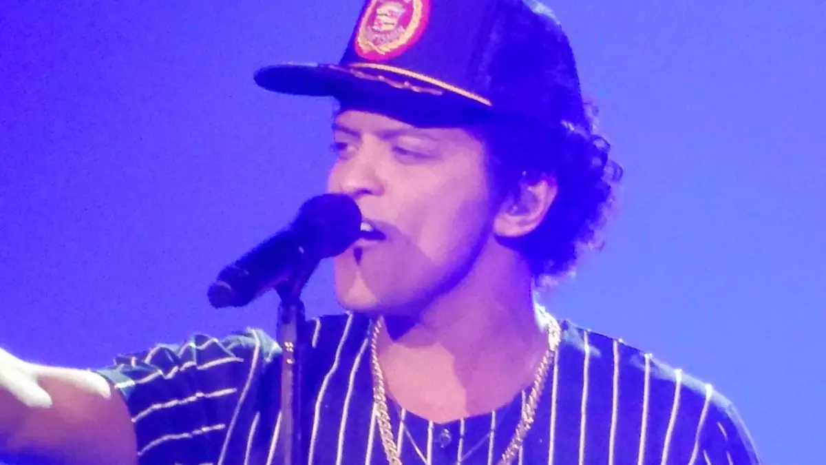 This is a photo of American entertainer Bruno Mars performing live during his 24K Magic World Tour