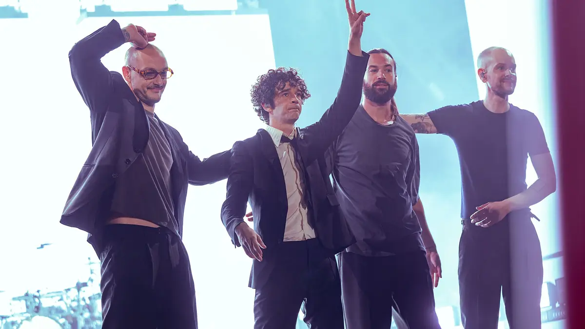 The 1975 performing at the Glastonbury Festival in 2025